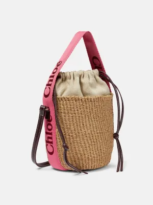 Beige basket bag with pink strap